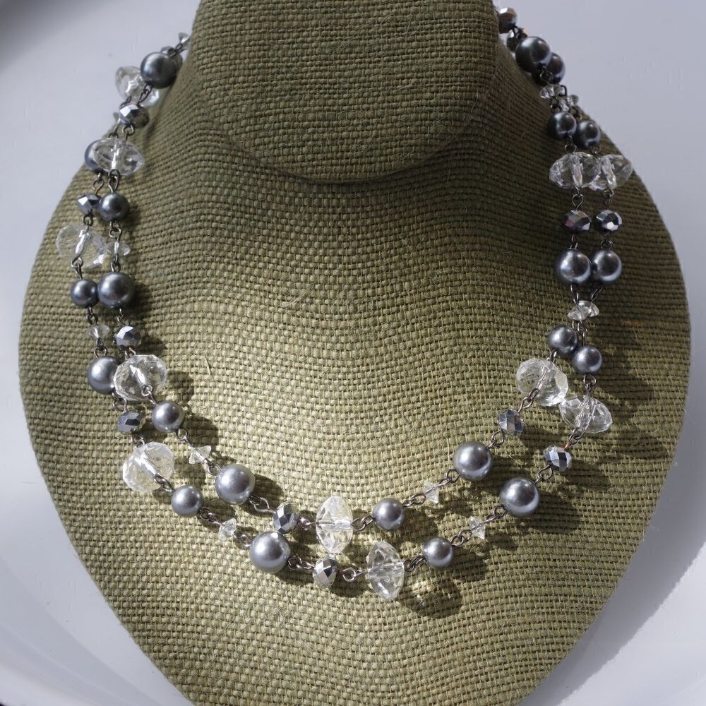 Women`s silver tone faceted bead chain necklace.